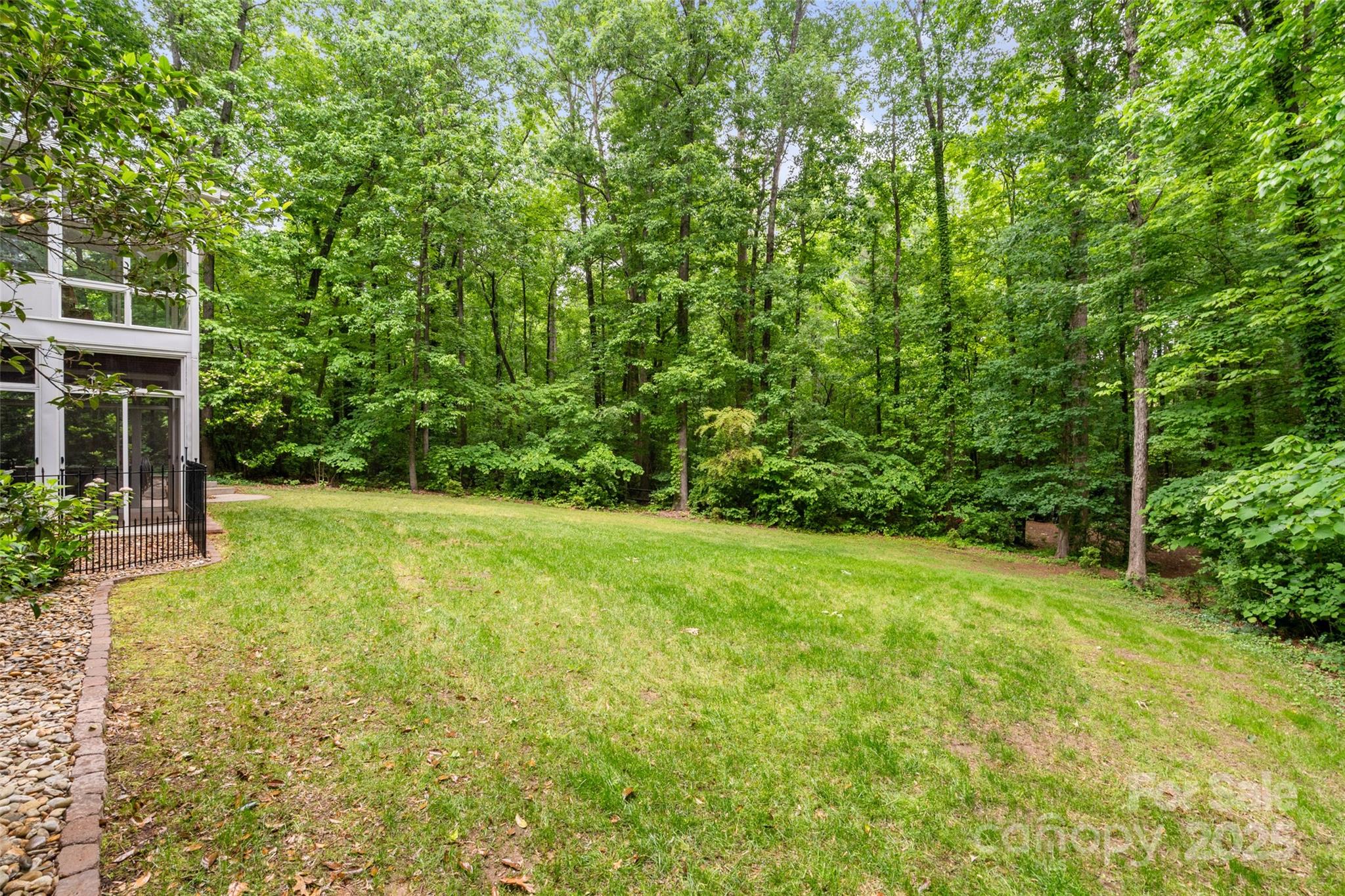 1669 Mary Ellen Drive Fort Mill, SC 29708 - Photo 46 of 48 a view of a backyard with a garden