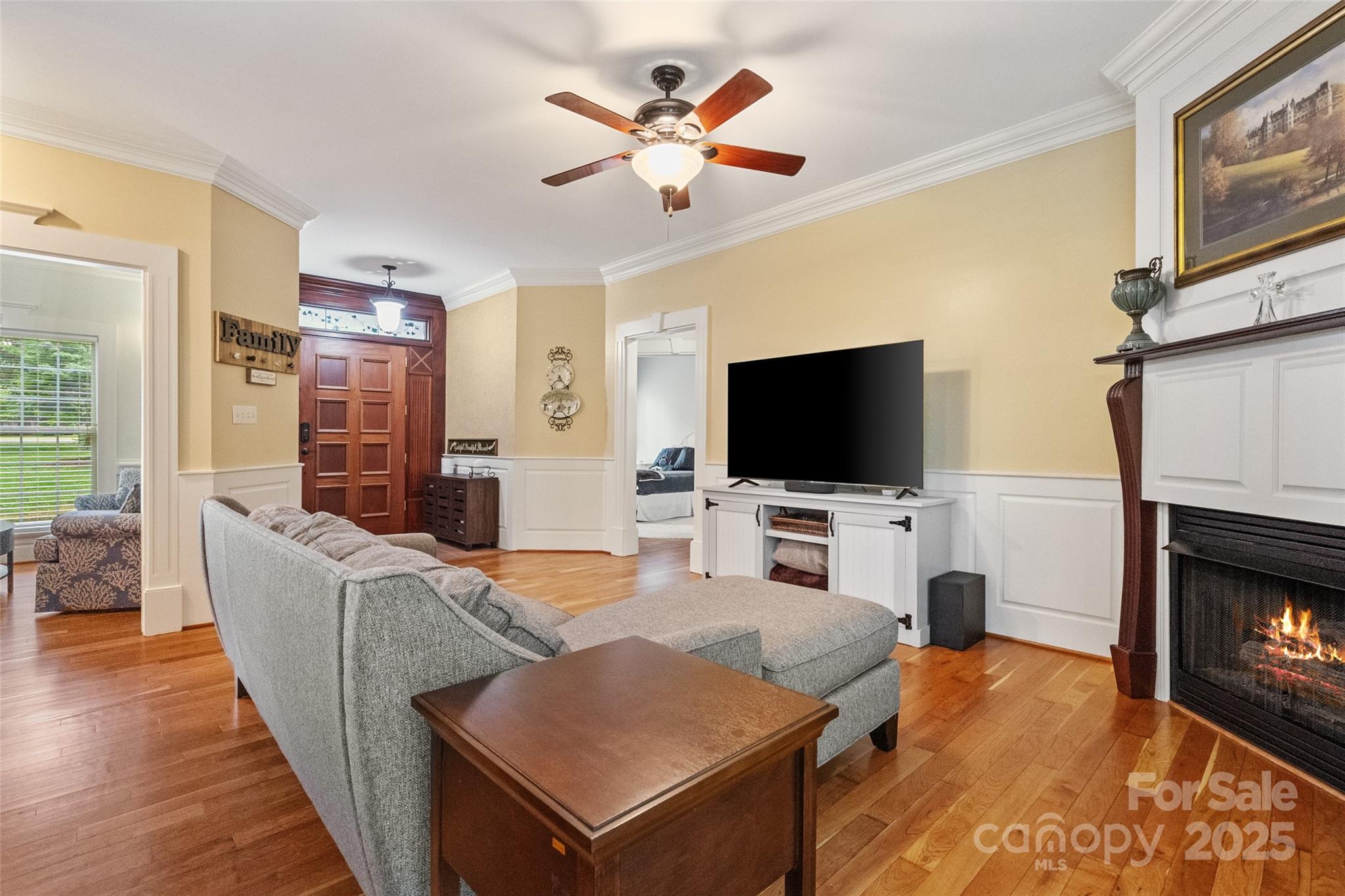 1669 Mary Ellen Drive Fort Mill, SC 29708 - Photo 10 of 48 a living room with fireplace furniture and a flat screen tv