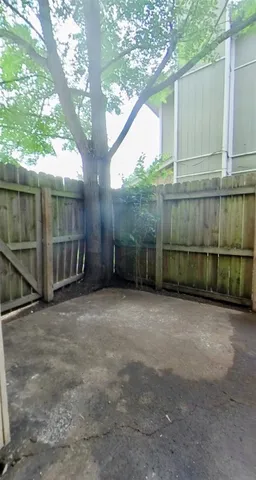 a view of a kitchen with wooden floor electronic appliances and electronic appliances