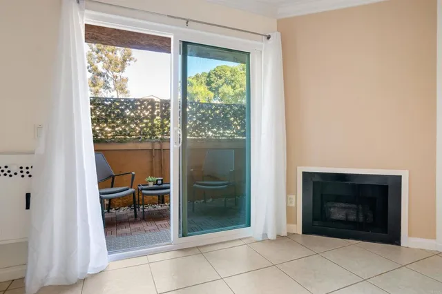 a view of a livingroom with furniture and a fireplace