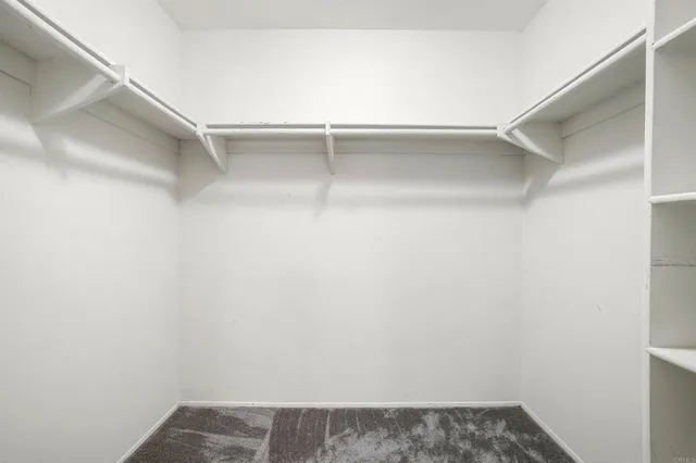 a view of an empty walk in closet
