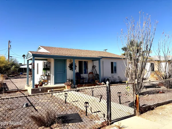 a view of a house with snow on the floor