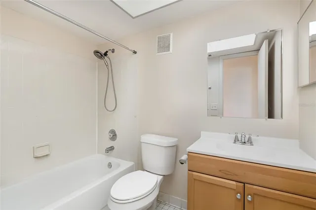 a bathroom with a sink a toilet and a bathtub