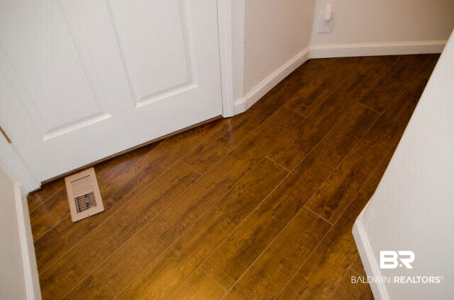 5751 Alabama Street Orange Beach, AL 36561 - Photo 22 of 25 Hardwood floors in both Bedrooms