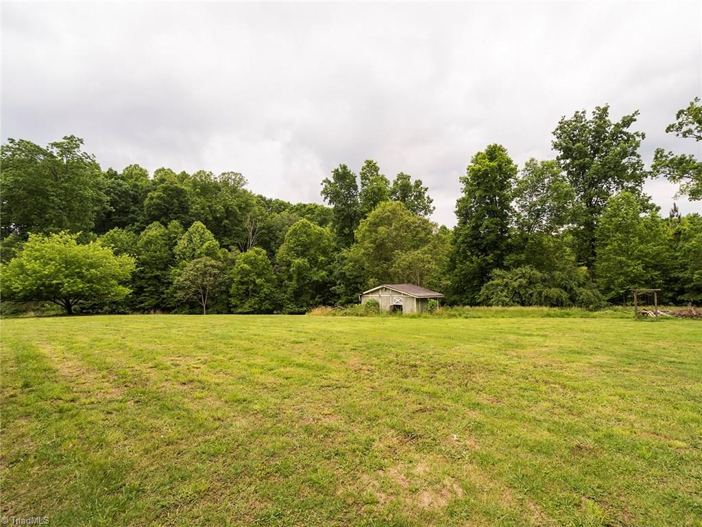 155 Kallam Mill Road Madison, NC 27025 - Photo 3 of 27 View of cleared area where home sits.
