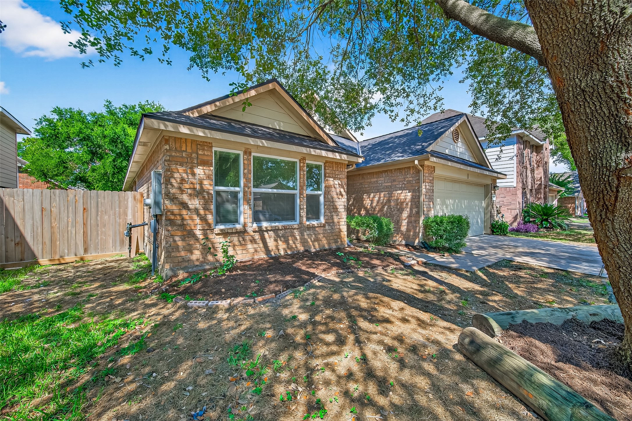 4630 Twisting Road Houston, TX 77084 - Photo 2 of 49 a view of a house with a yard and tree s