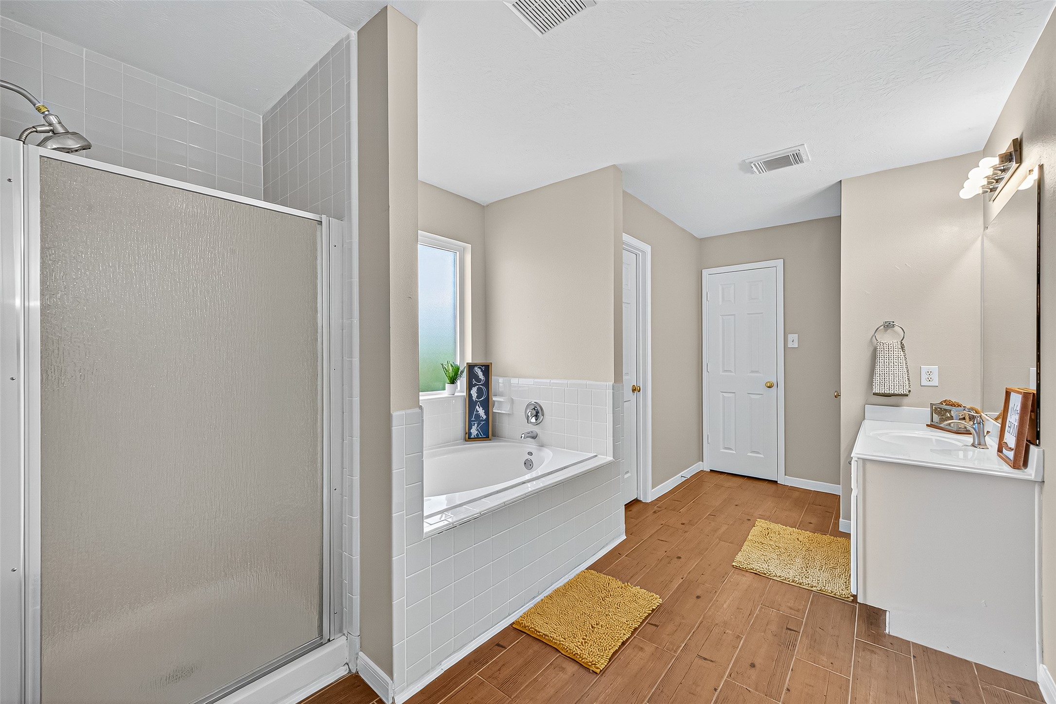 4630 Twisting Road Houston, TX 77084 - Photo 33 of 49 a bathroom with a bathtub sink and toilet