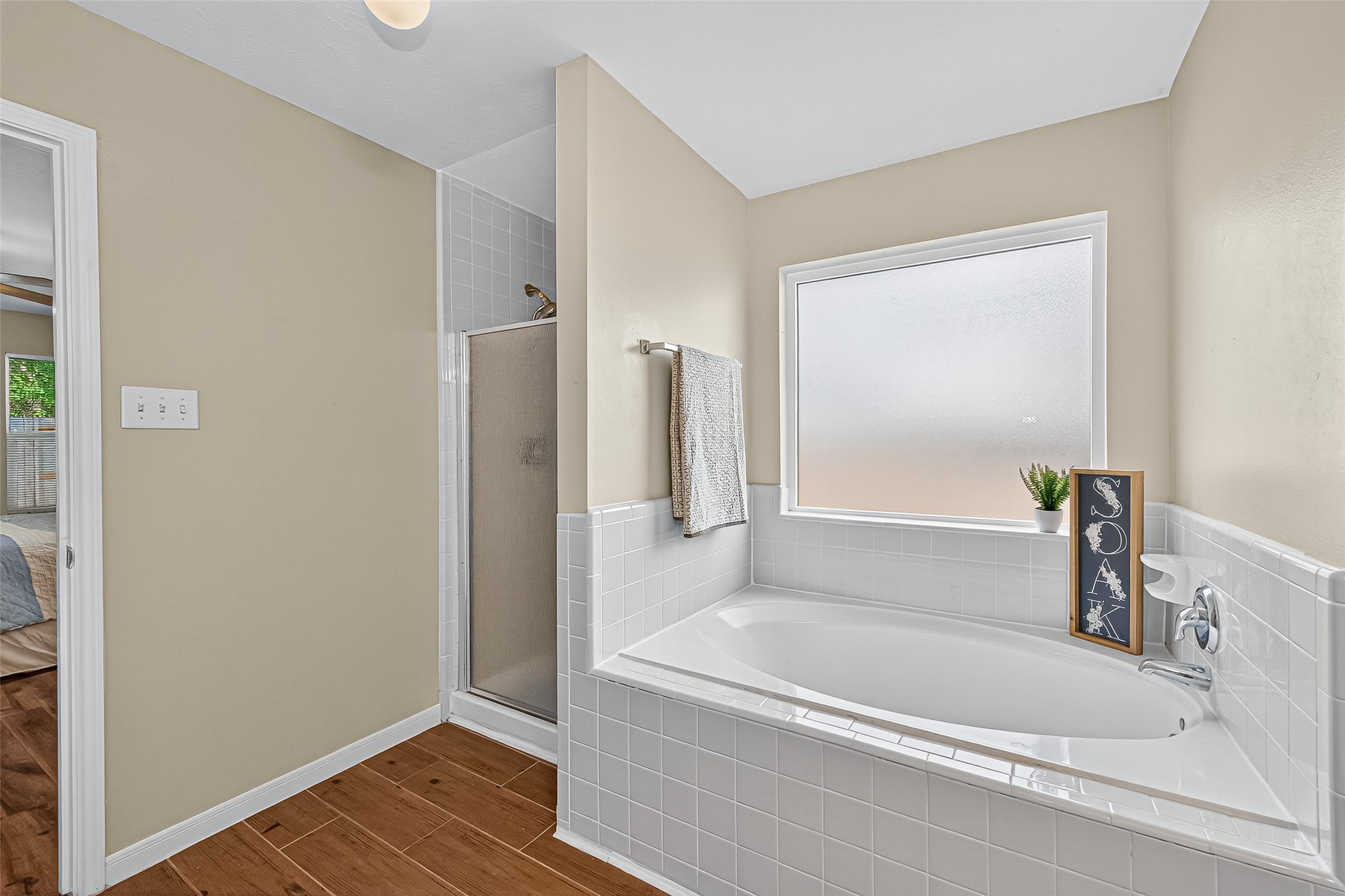 4630 Twisting Road Houston, TX 77084 - Photo 34 of 49 a bathroom with a bathtub and a shower