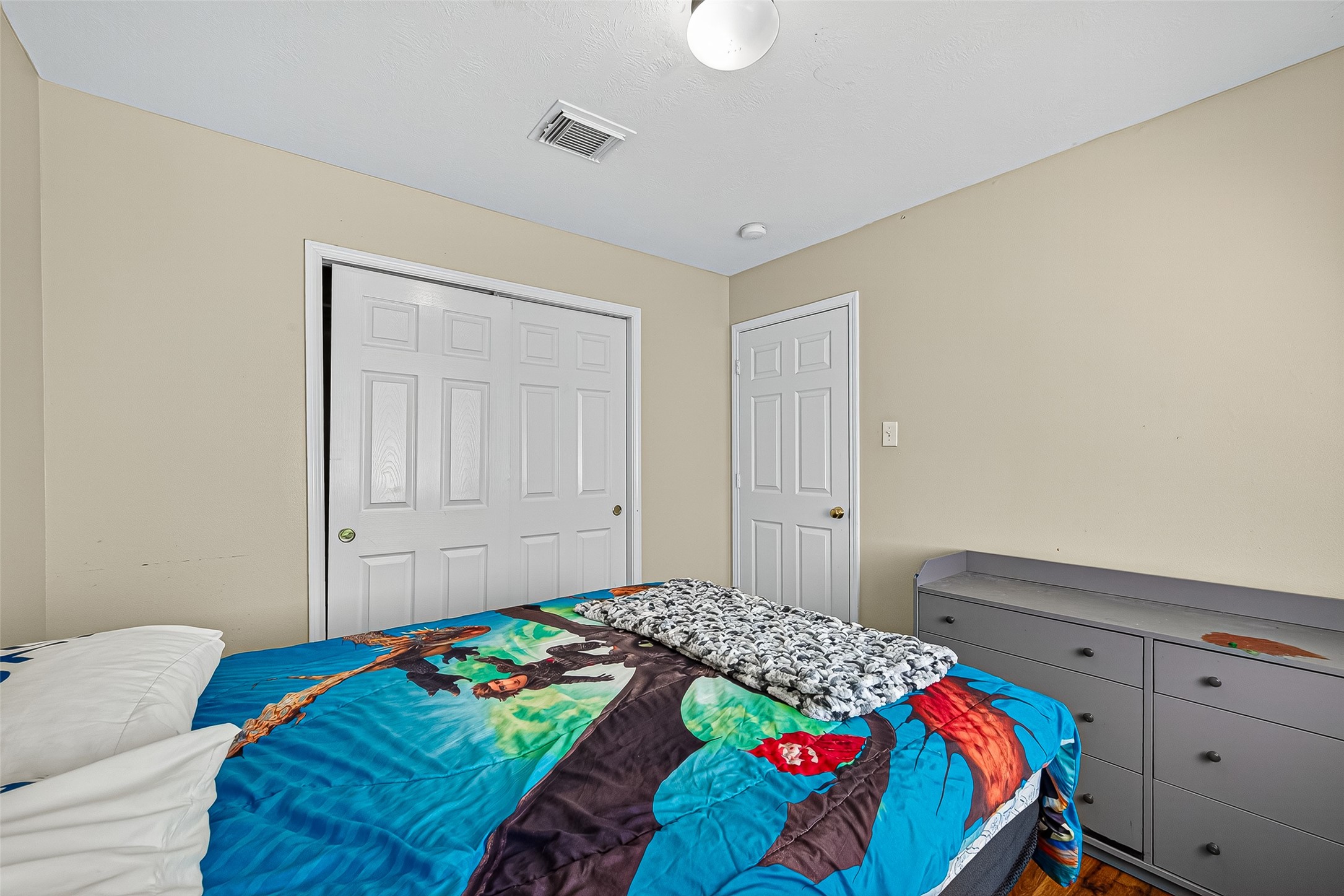 4630 Twisting Road Houston, TX 77084 - Photo 38 of 49 a bedroom with a bed and a window