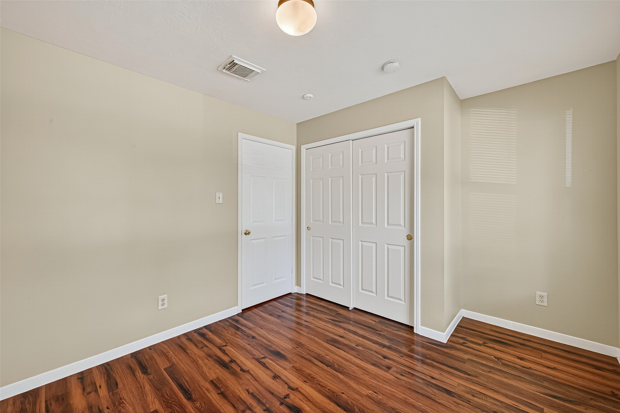 4630 Twisting Road Houston, TX 77084 - Photo 41 of 49 a view of an empty room with wooden floor