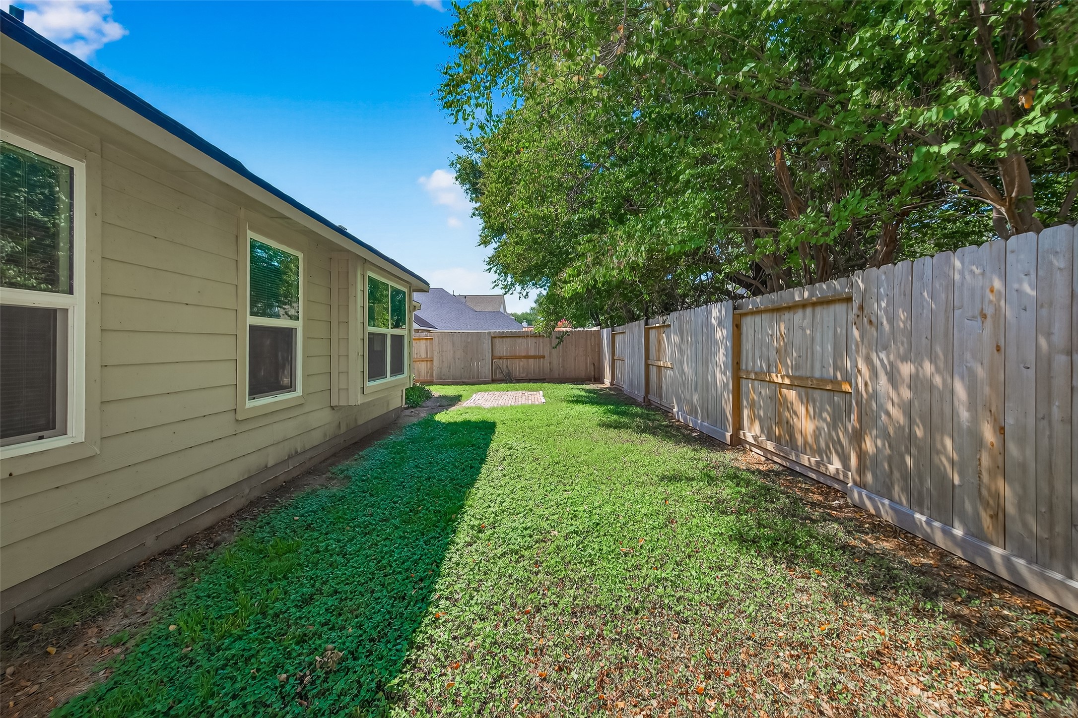 4630 Twisting Road Houston, TX 77084 - Photo 49 of 49 a view of a back yard of the house