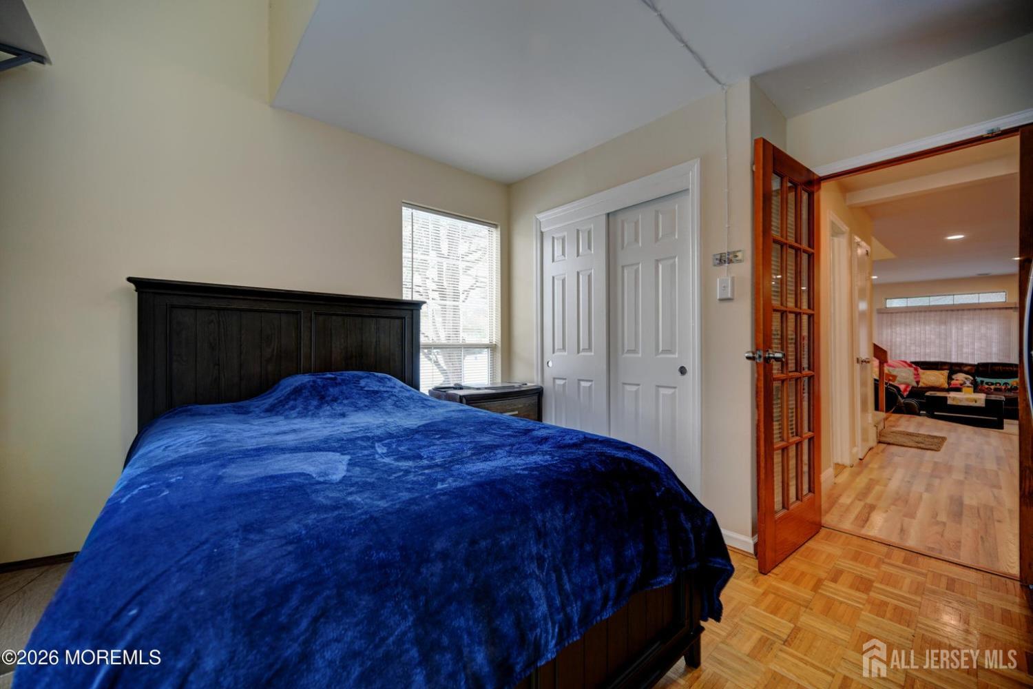22 Borell Square Parlin, NJ 08859 - Photo 13 of 32 a bedroom with a bed and a view of en suite bathroom
