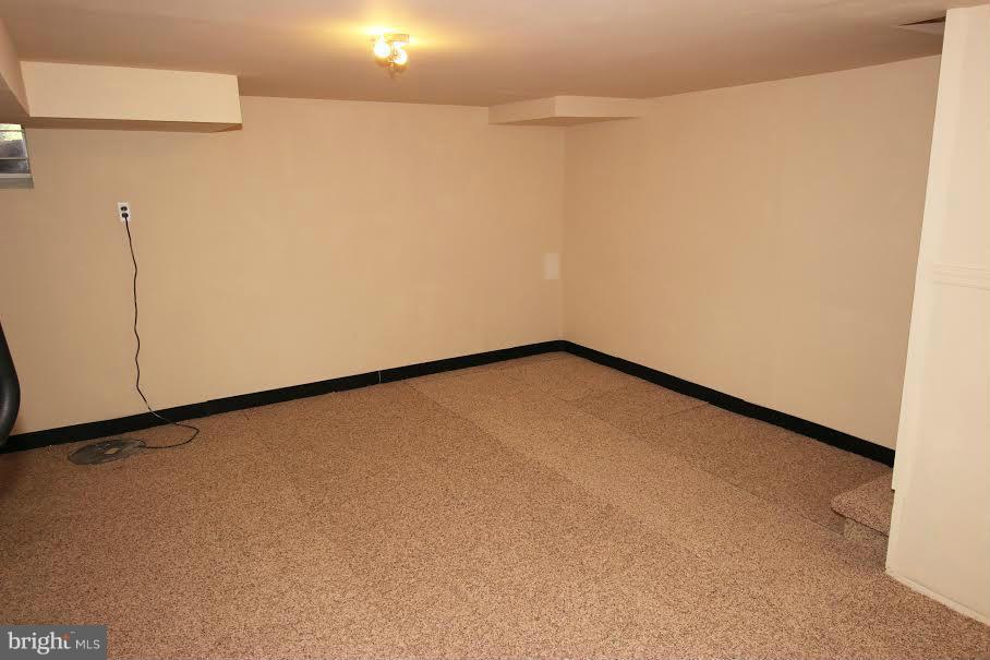 316 Stemmers Run Road Baltimore, MD 21221 - Photo 11 of 20 a view of a room with an empty space