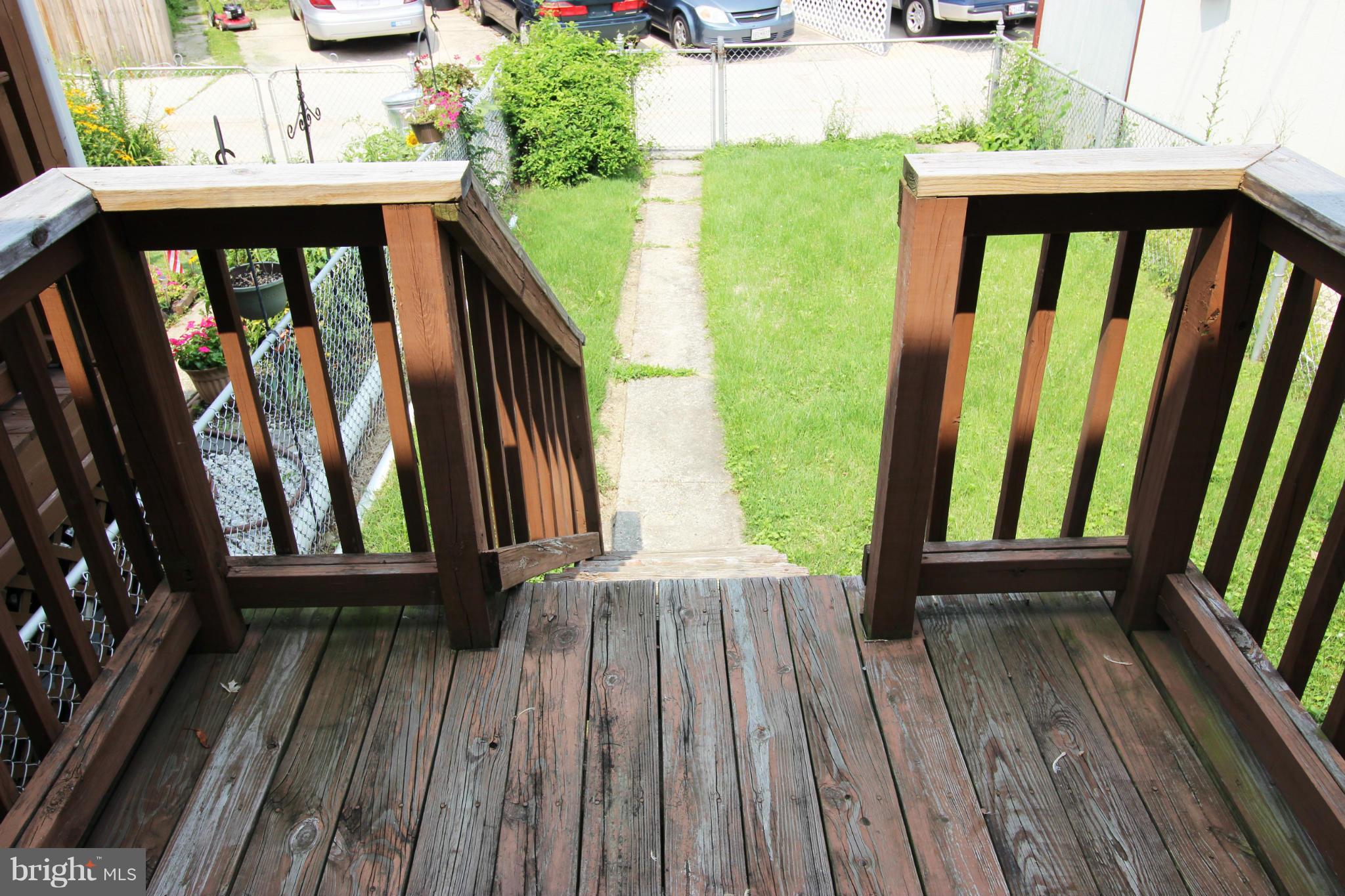 316 Stemmers Run Road Baltimore, MD 21221 - Photo 16 of 20 a view of balcony with wooden floor