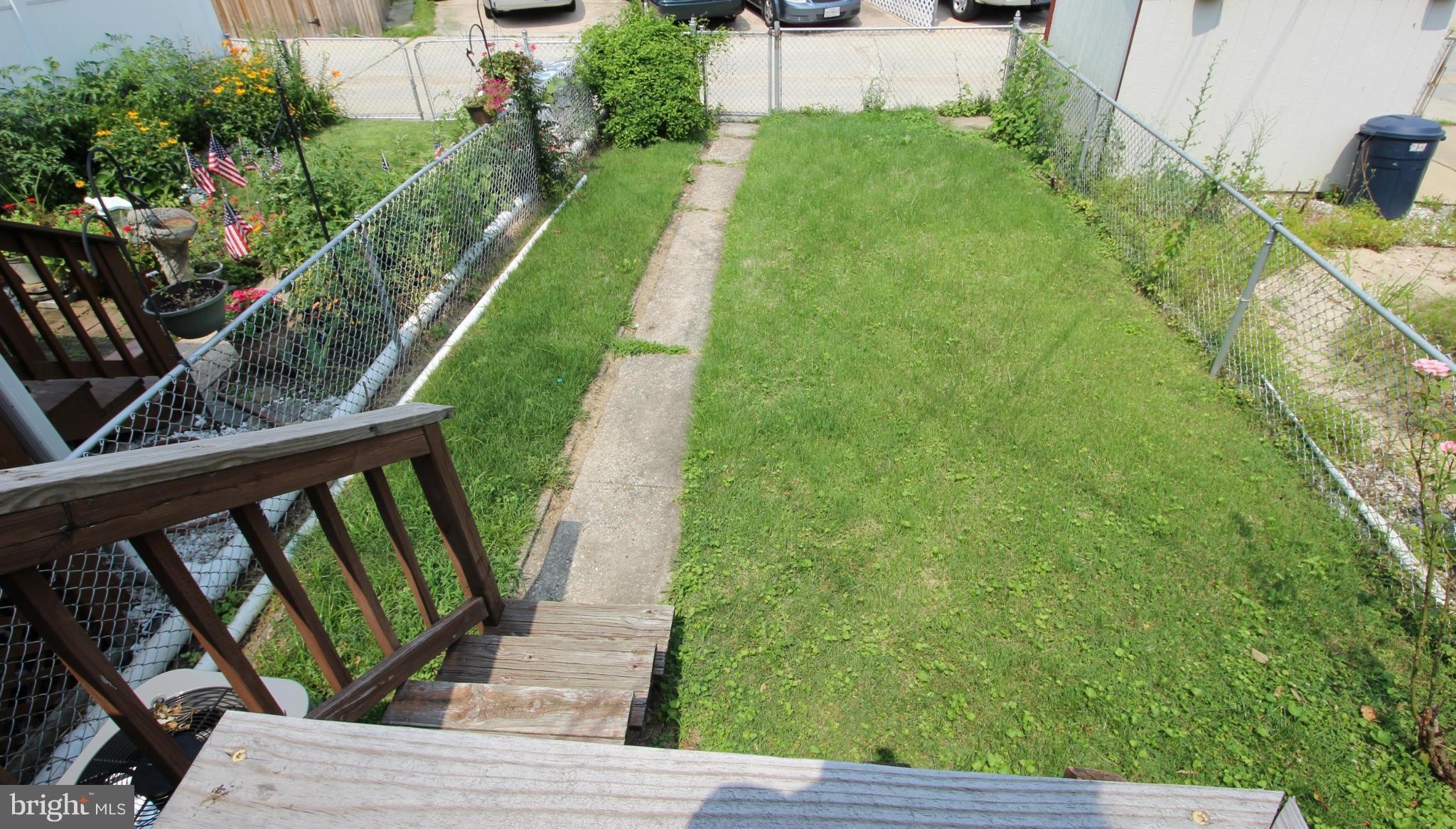 316 Stemmers Run Road Baltimore, MD 21221 - Photo 17 of 20 a view of a garden from a balcony