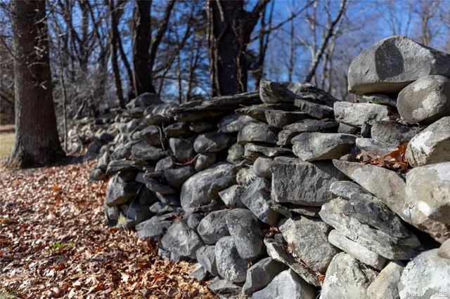 a view of entryway with wooden stairs