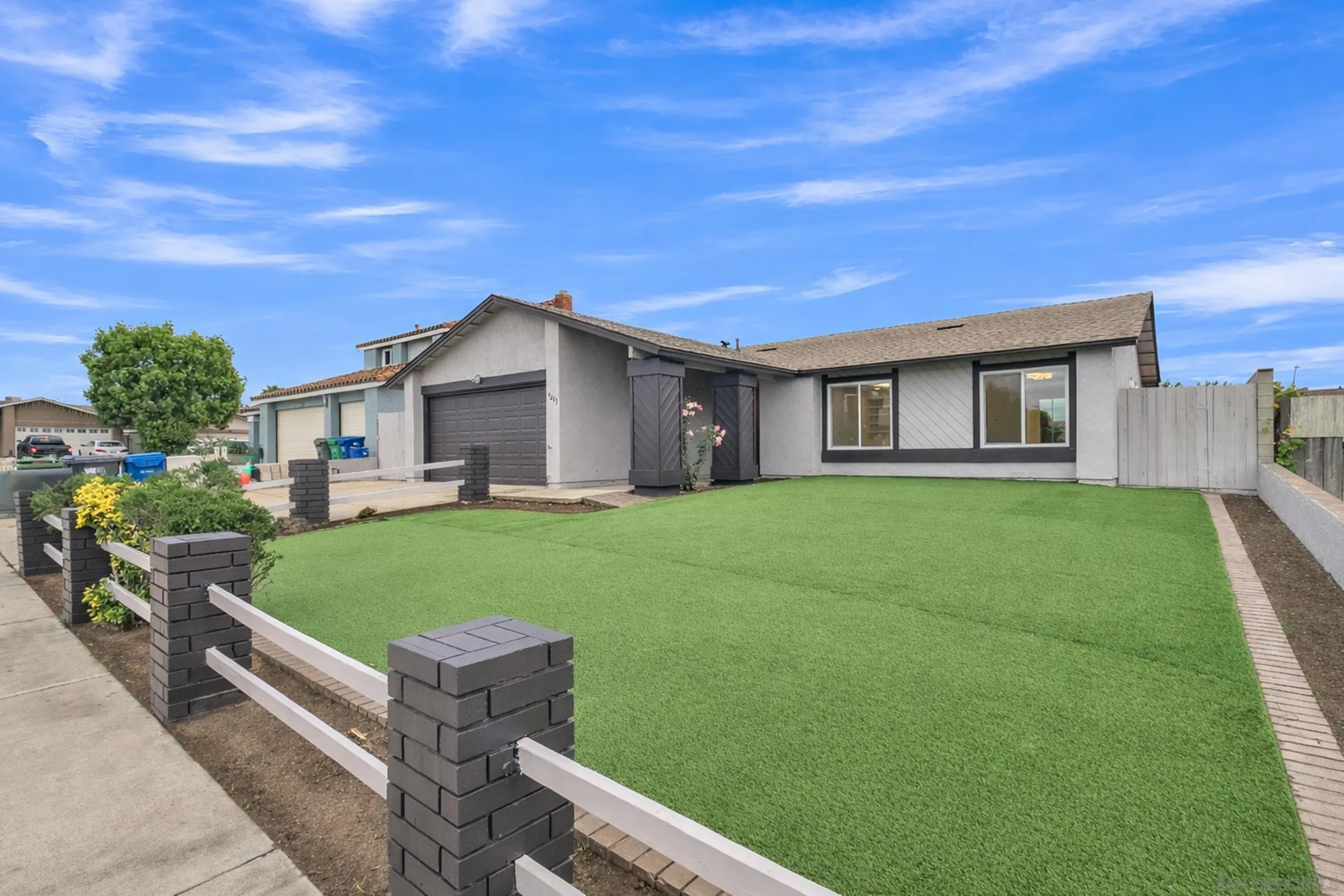 9253 Les Road Santee, CA 92071 - Photo 5 of 35 a house view with a garden space