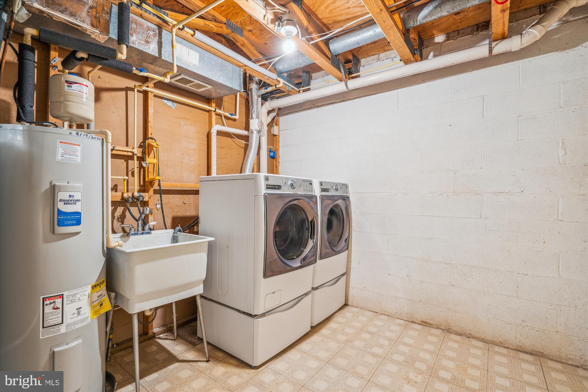 9731 Early Spring Way Columbia, MD 21046 - Photo 49 of 69 Laundry
