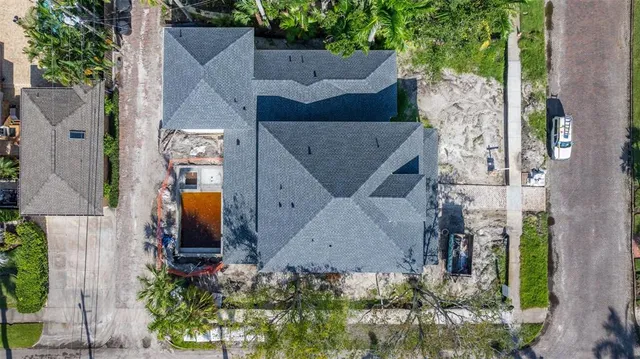 an aerial view of residential house with outdoor space