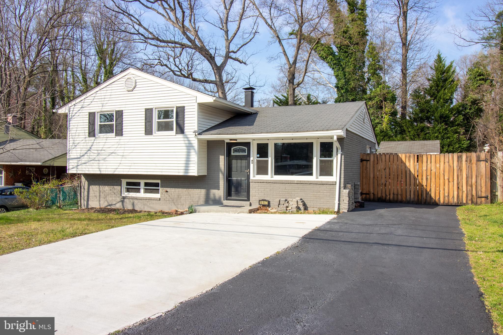 18907 Barnette Circle Triangle, VA 22172 - Photo 1 of 39 a front view of a house with a garage