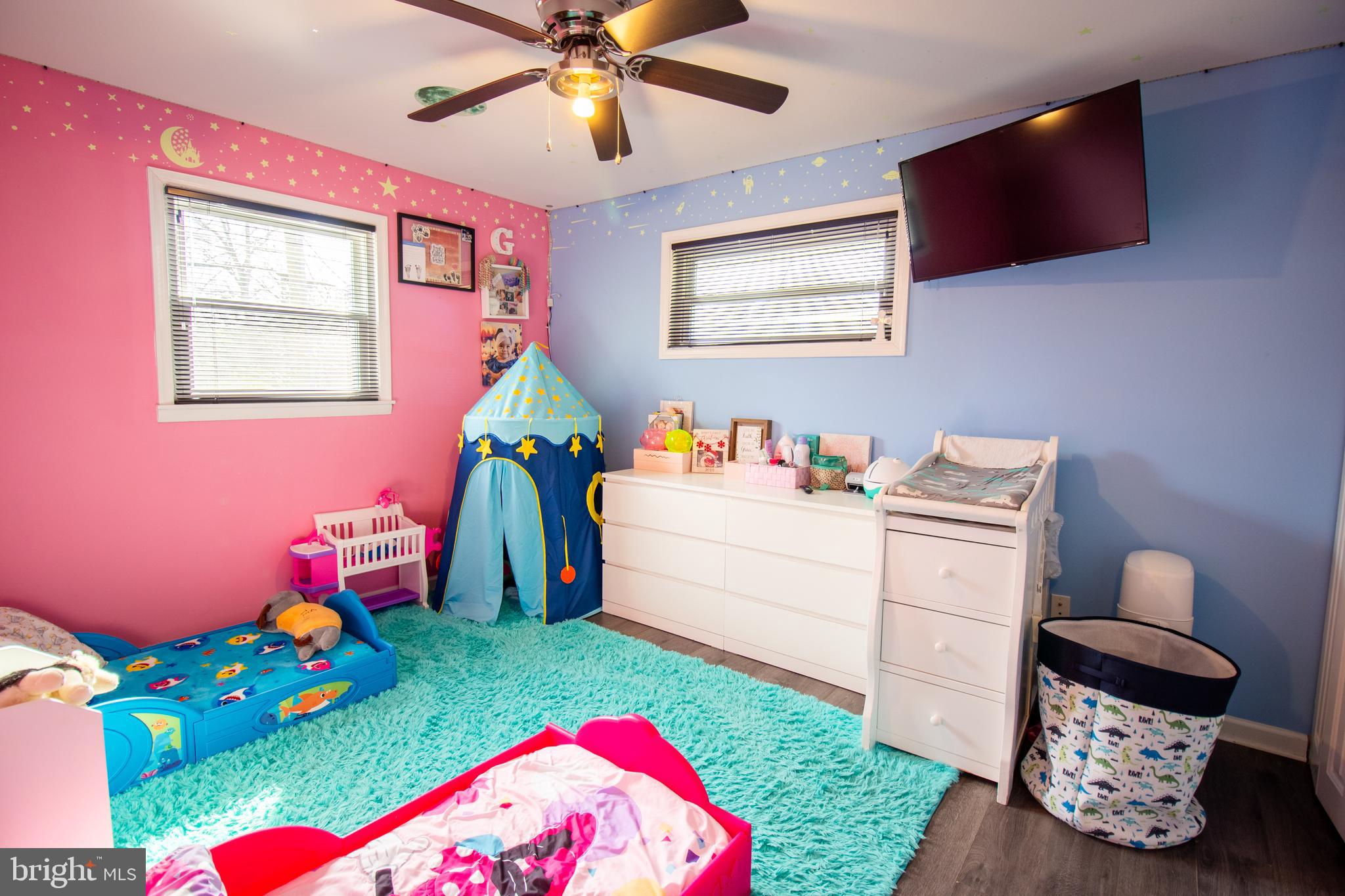 18907 Barnette Circle Triangle, VA 22172 - Photo 20 of 39 a bedroom with furniture and a baby crib