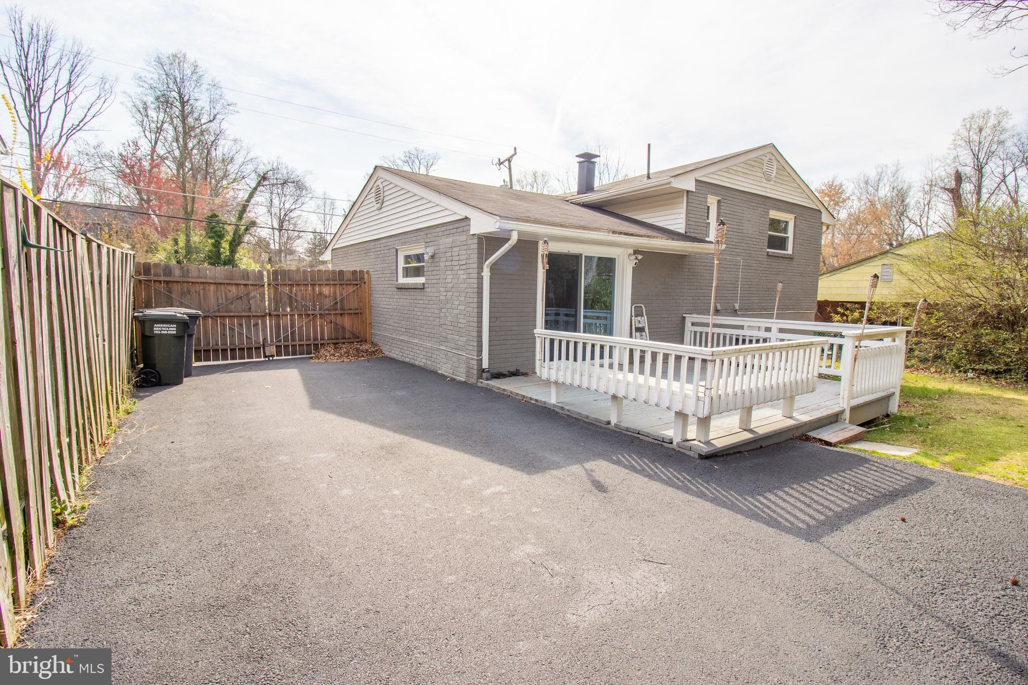 18907 Barnette Circle Triangle, VA 22172 - Photo 30 of 39 a view of a house with a yard and fence