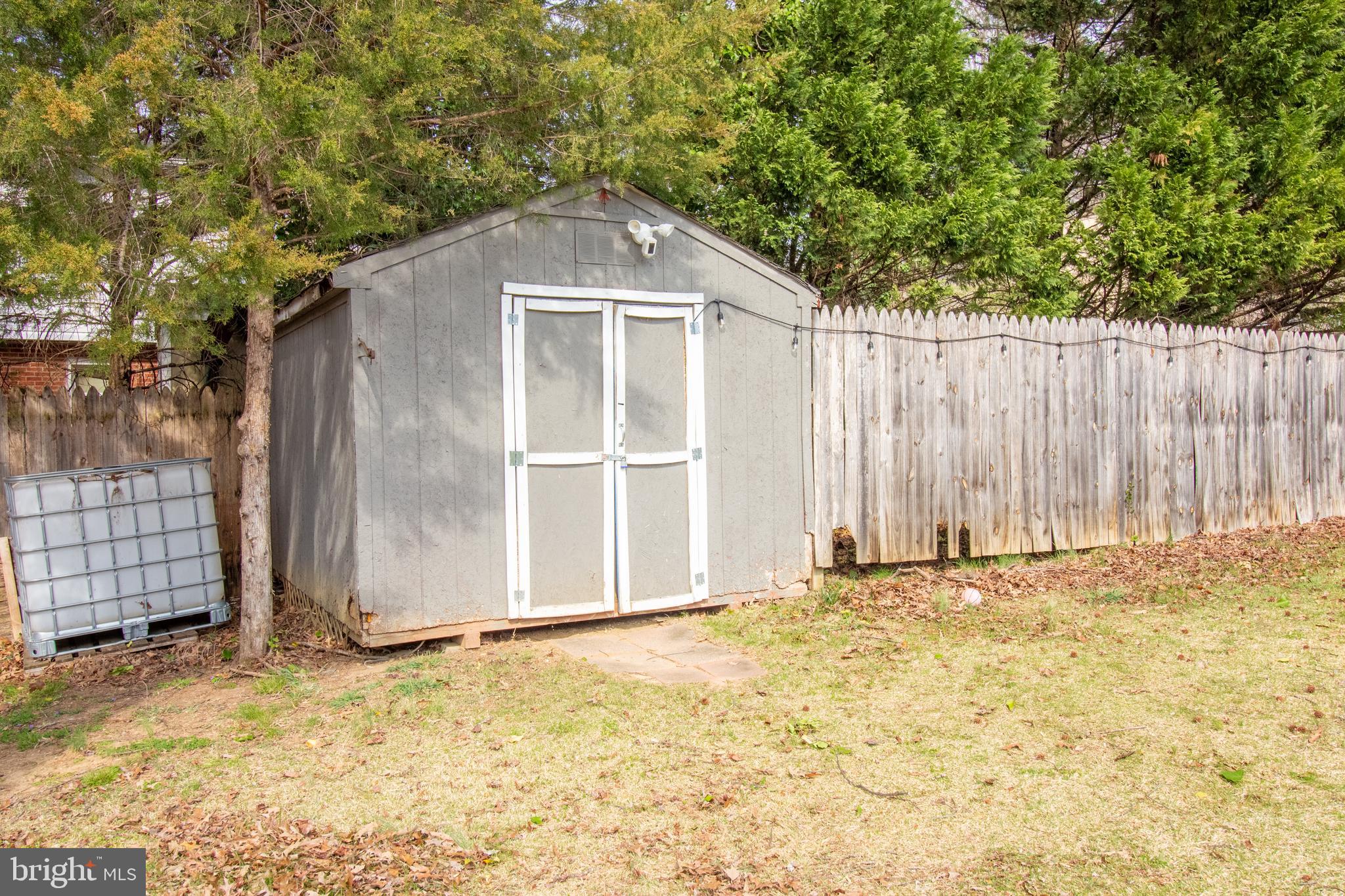 18907 Barnette Circle Triangle, VA 22172 - Photo 32 of 39 a front view of a house with a yard