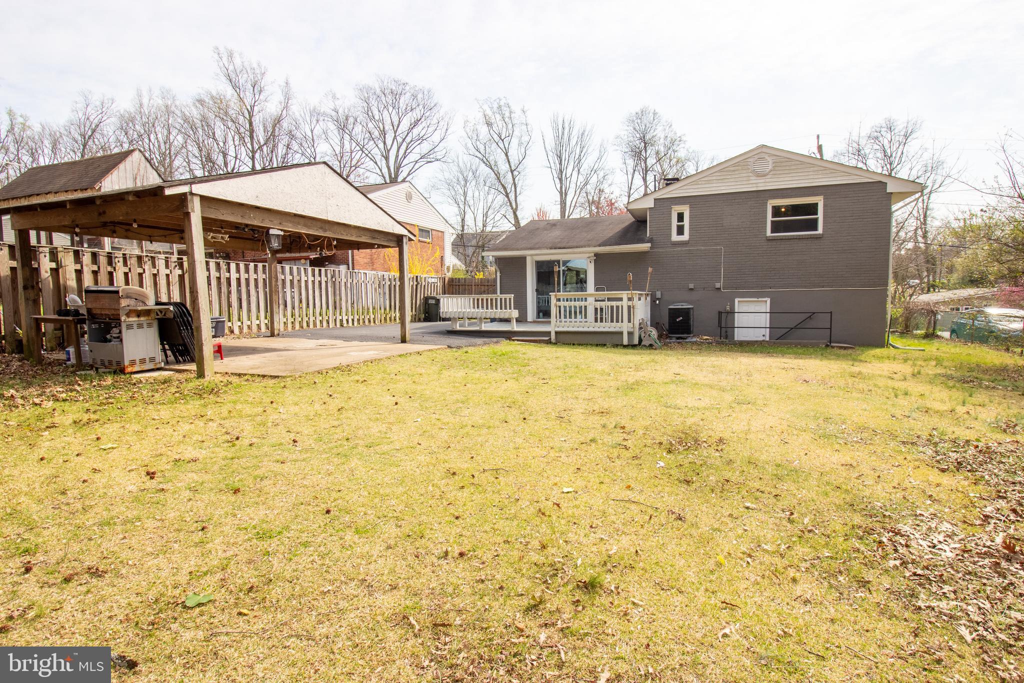 18907 Barnette Circle Triangle, VA 22172 - Photo 34 of 39 a front view of a house with a yard and garage