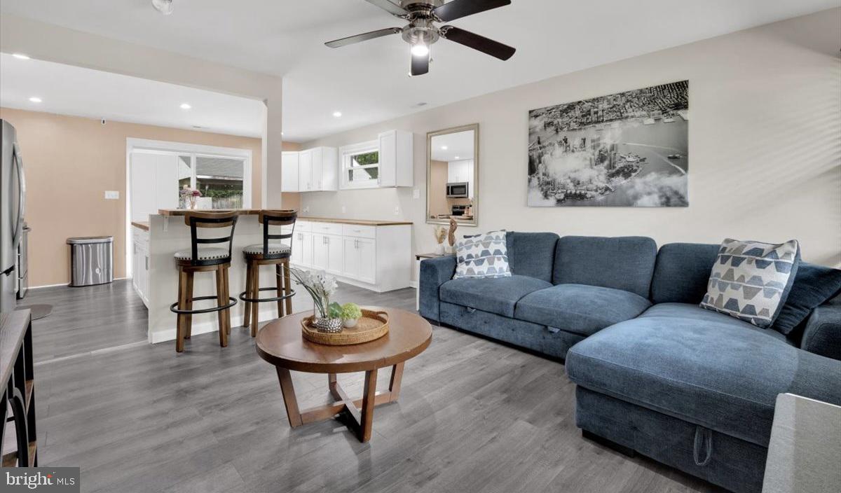 18907 Barnette Circle Triangle, VA 22172 - Photo 8 of 39 a living room with furniture a window and a table
