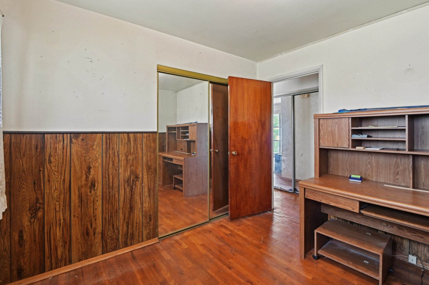 225 Bode Road Hoffman Estates, IL 60169 - Photo 16 of 26 a room with wooden floor and furniture