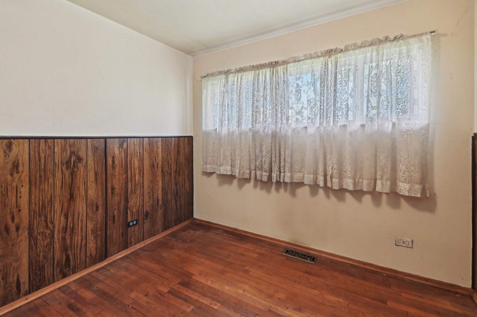 225 Bode Road Hoffman Estates, IL 60169 - Photo 17 of 26 a view of a room with wooden floor