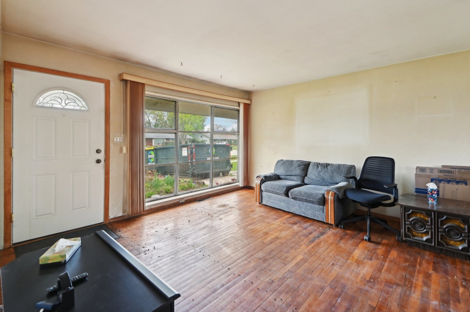 225 Bode Road Hoffman Estates, IL 60169 - Photo 2 of 26 a living room with furniture and a window