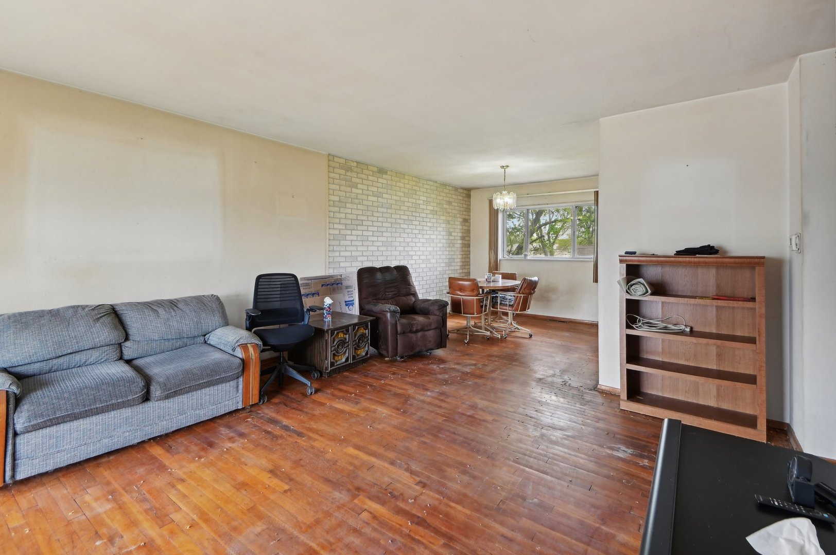 225 Bode Road Hoffman Estates, IL 60169 - Photo 4 of 26 a living room with furniture and wooden floor