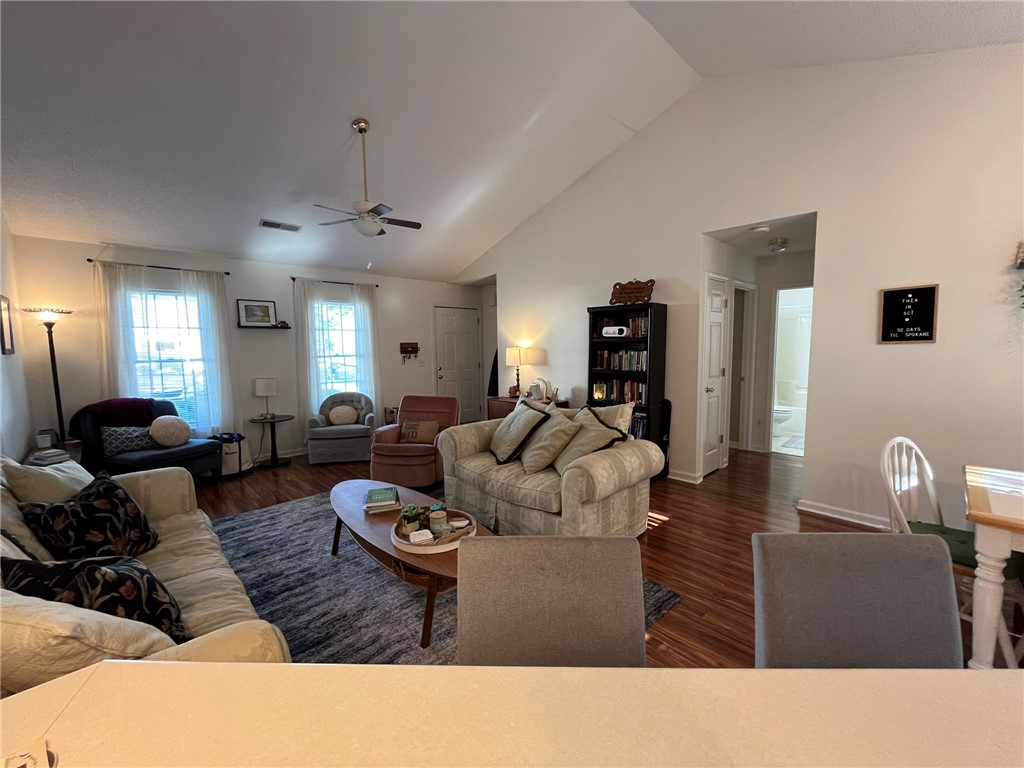 116 Arbors Court Central, SC 29630 - Photo 4 of 27 Hardwood floors and vaulted ceilings elevate this inviting living space.