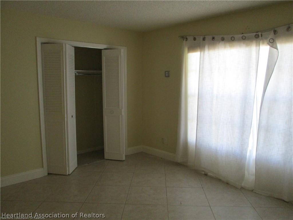 3062 Orchid Road Lake Placid, FL 33852 - Photo 8 of 11 a view of empty room with windows