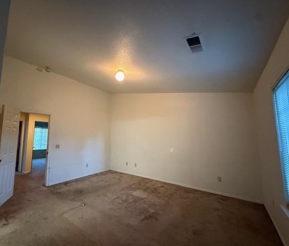 978 Doe Court Merced, CA 95340 - Photo 12 of 18 an empty room with a natural light