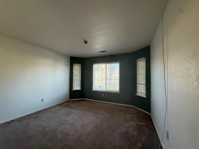 978 Doe Court Merced, CA 95340 - Photo 14 of 18 a view of an empty room with a window