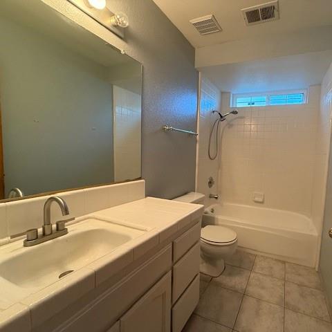 978 Doe Court Merced, CA 95340 - Photo 16 of 18 a bathroom with a sink a toilet and shower