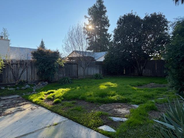 978 Doe Court Merced, CA 95340 - Photo 18 of 18 a view of a backyard with a garden