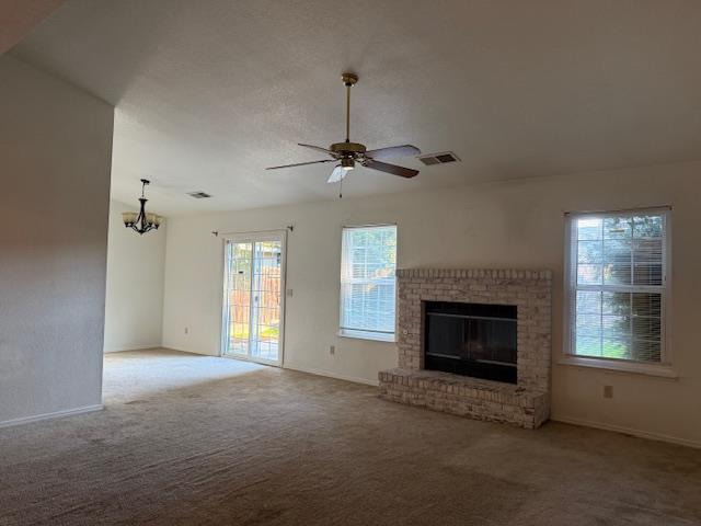 978 Doe Court Merced, CA 95340 - Photo 5 of 18 a view of an empty room with a fireplace and a window