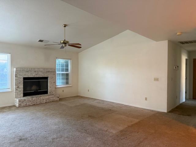978 Doe Court Merced, CA 95340 - Photo 6 of 18 a view of an empty room with a fireplace and a window