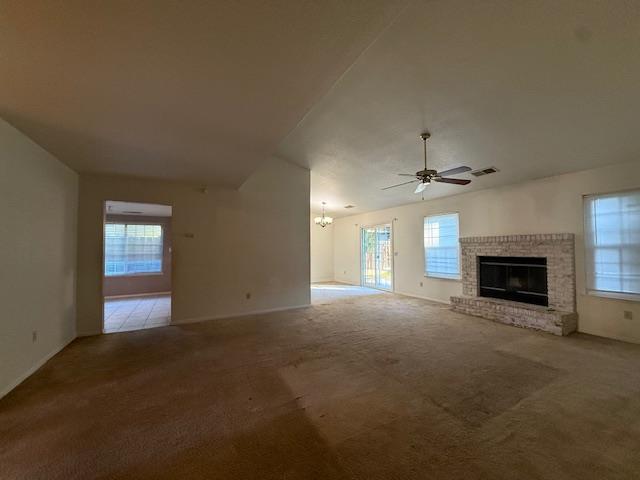 978 Doe Court Merced, CA 95340 - Photo 9 of 18 an empty room with windows and fireplace