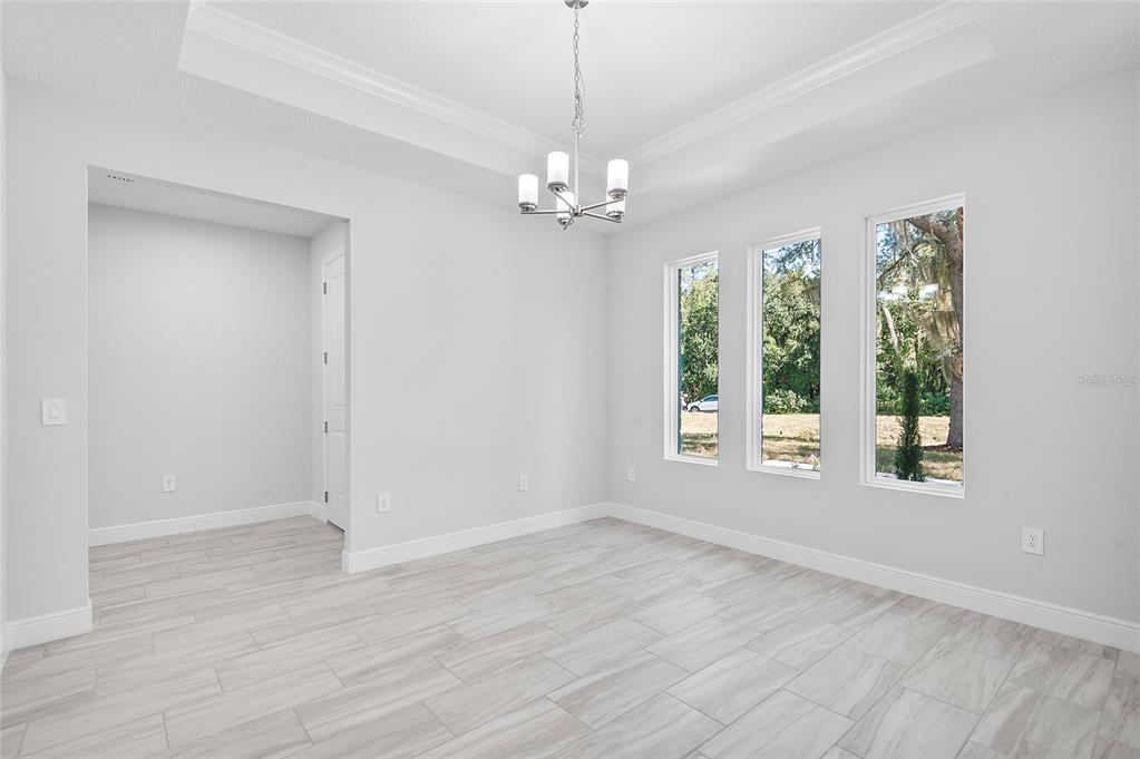 304 North Jungle Road Geneva, FL 32732 - Photo 8 of 49 a view of an empty room with a window