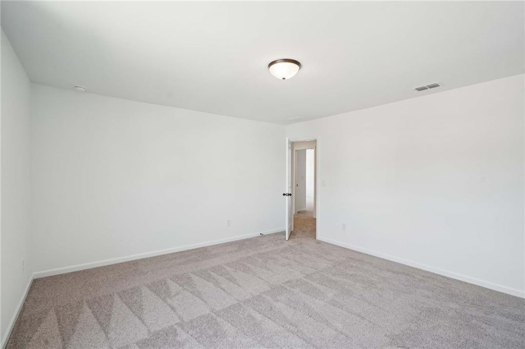 308 Silverleaf Trail Bethlehem, GA 30620 - Photo 21 of 36 a view of an empty room
