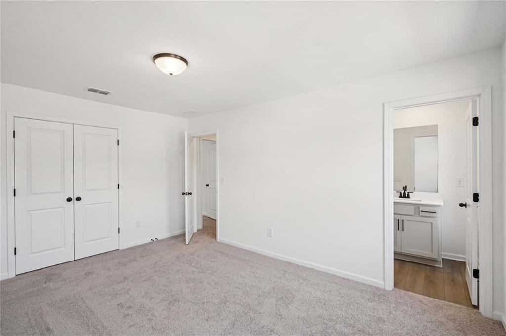 308 Silverleaf Trail Bethlehem, GA 30620 - Photo 25 of 36 a view of an empty room
