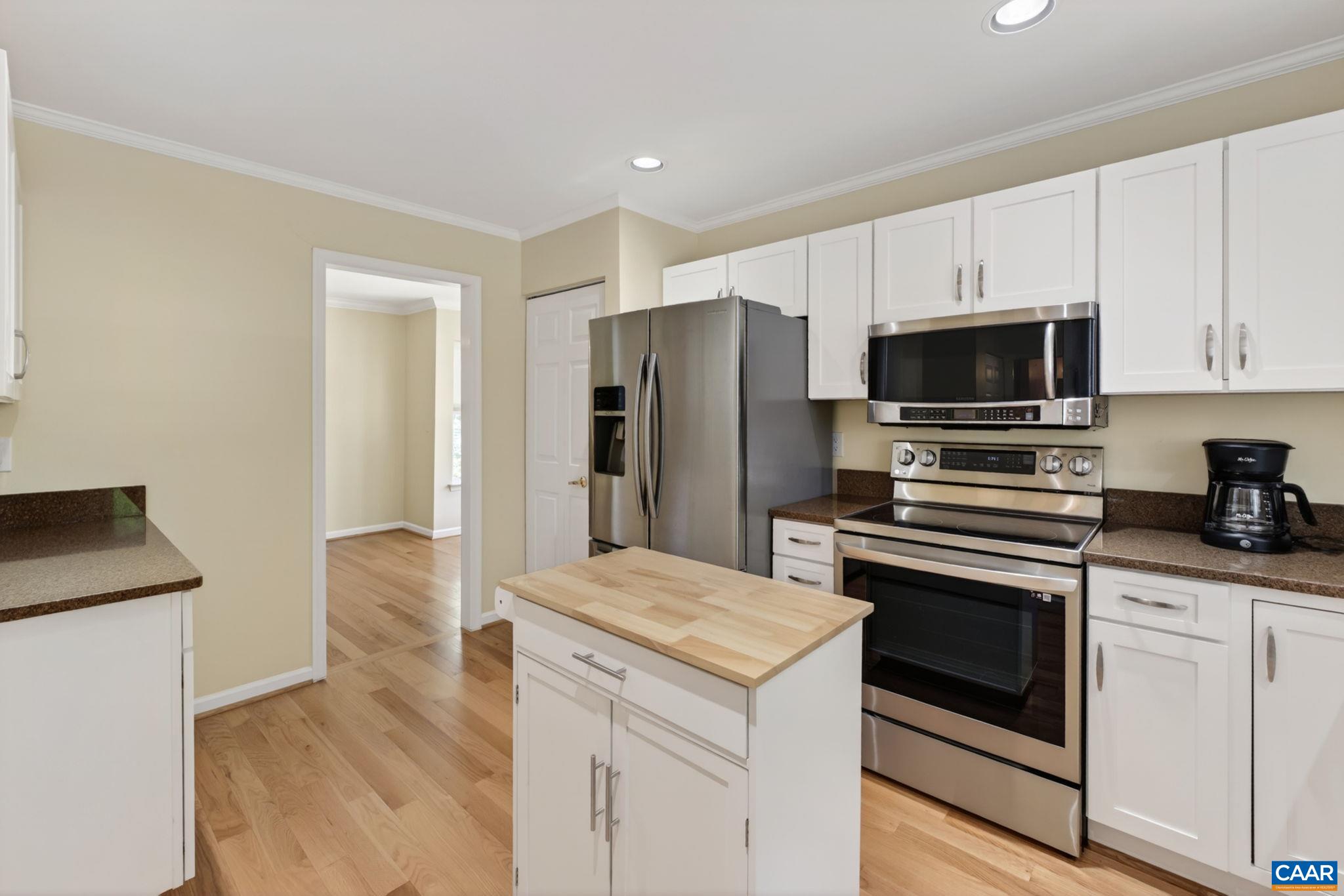 590 Mockingbird Way Charlottesville, VA 22901 - Photo 15 of 43 a kitchen with stainless steel appliances a stove microwave and refrigerator