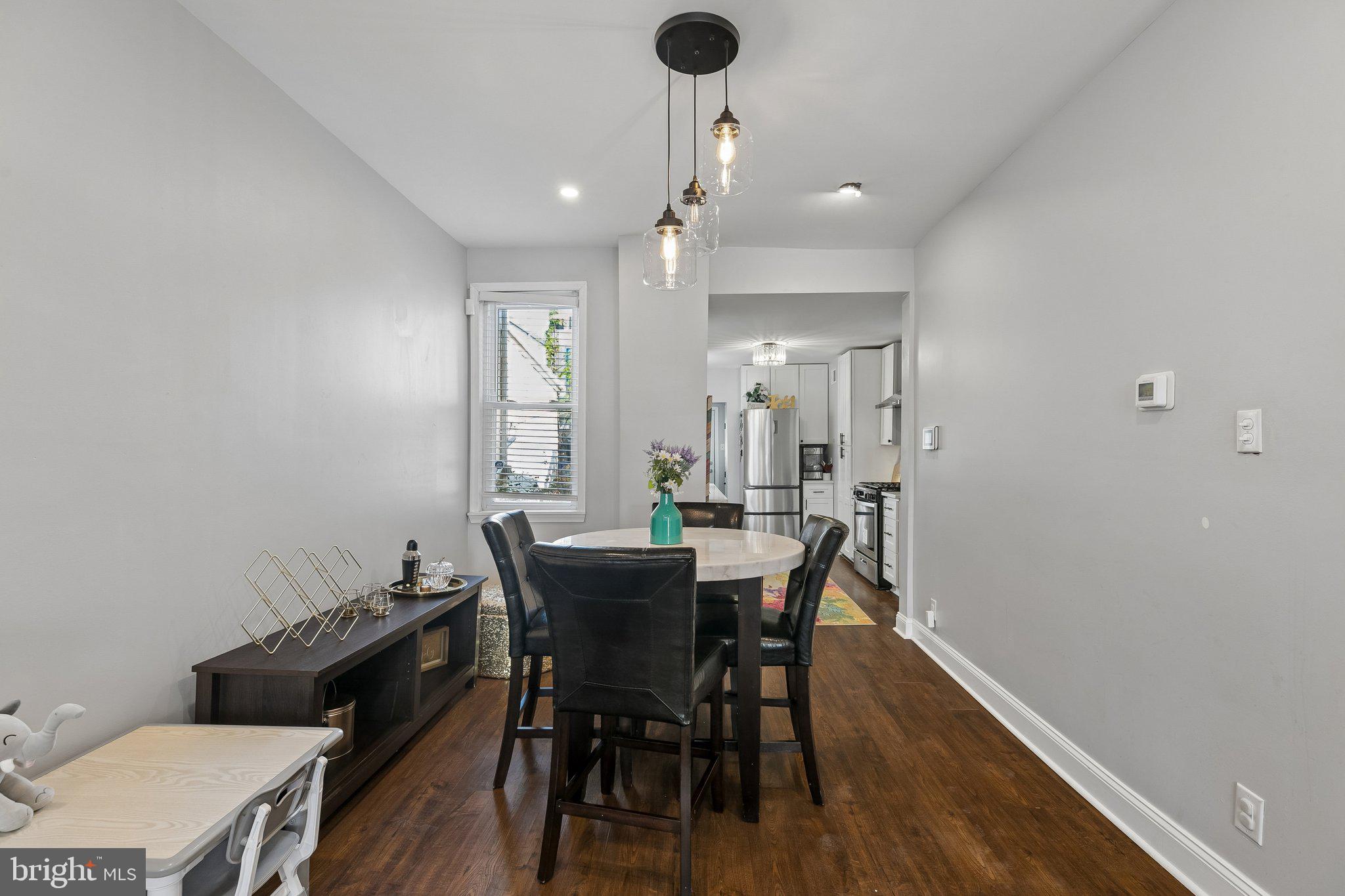5365 Morris Street Philadelphia, PA 19144 - Photo 14 of 35 a view of a dining room with furniture and wooden floor