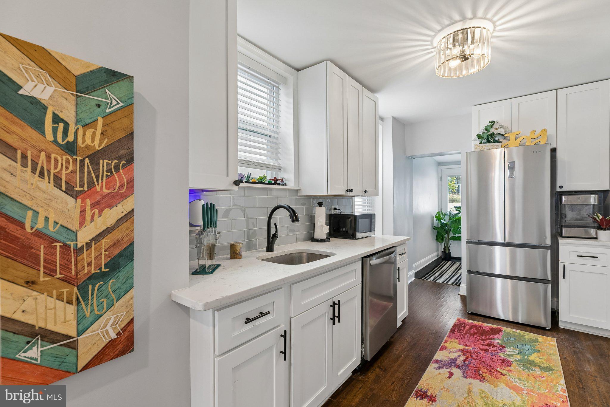 5365 Morris Street Philadelphia, PA 19144 - Photo 16 of 35 a kitchen with a sink appliances and cabinets