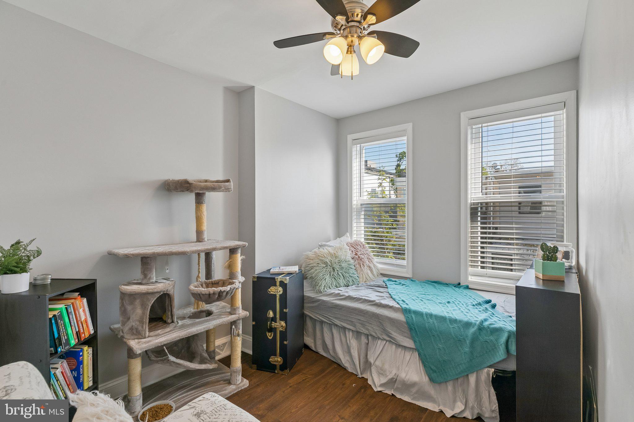 5365 Morris Street Philadelphia, PA 19144 - Photo 23 of 35 a bedroom with a bed and a chandelier