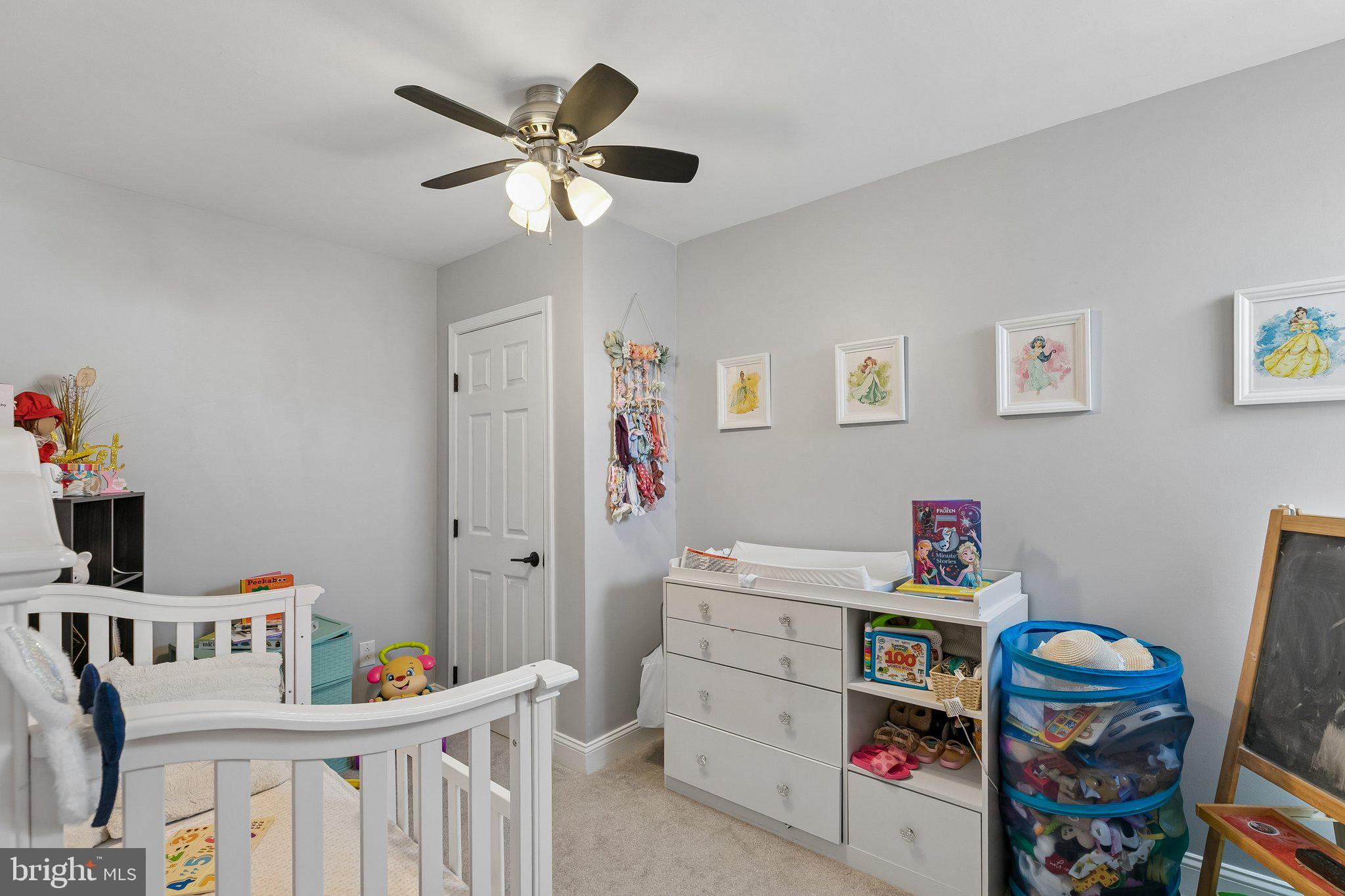 5365 Morris Street Philadelphia, PA 19144 - Photo 24 of 35 a room with furniture a baby crib and a window